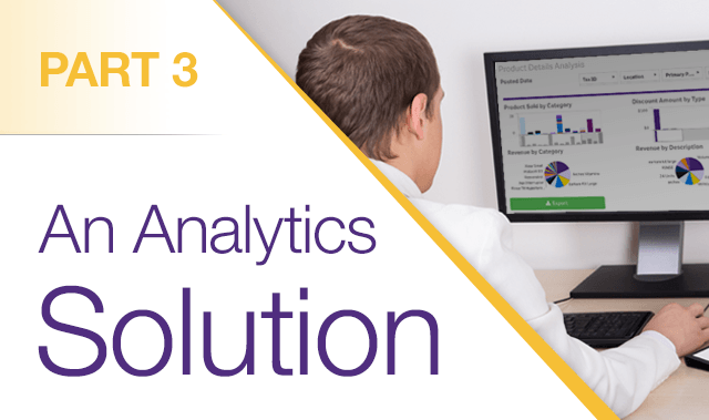 man looking at desktop with charts and graphs