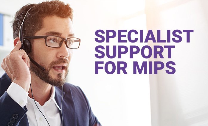 male wearing glasses, a suite and headset talking male wearing glasses, a suite and headset talking