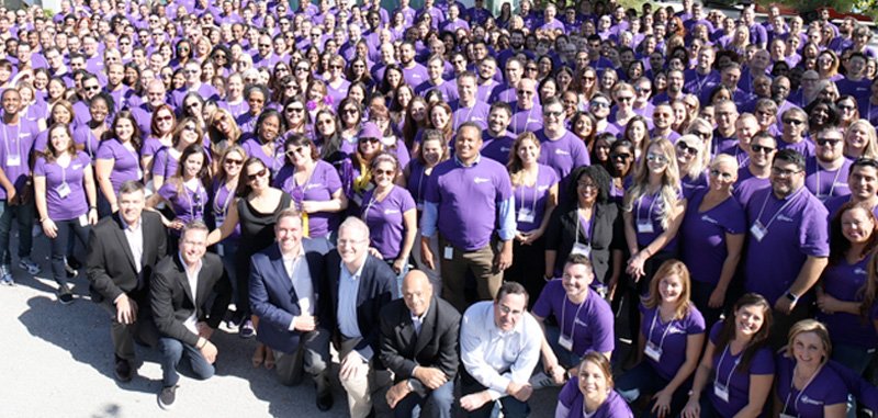 group of Modernizing Medicine employees in purple shirts group of Modernizing Medicine employees in purple shirts