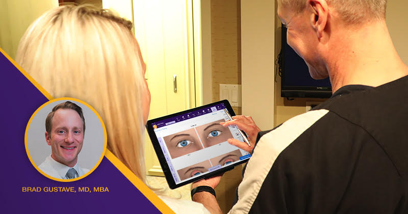 ophthalmologist using iPad EHR with patient