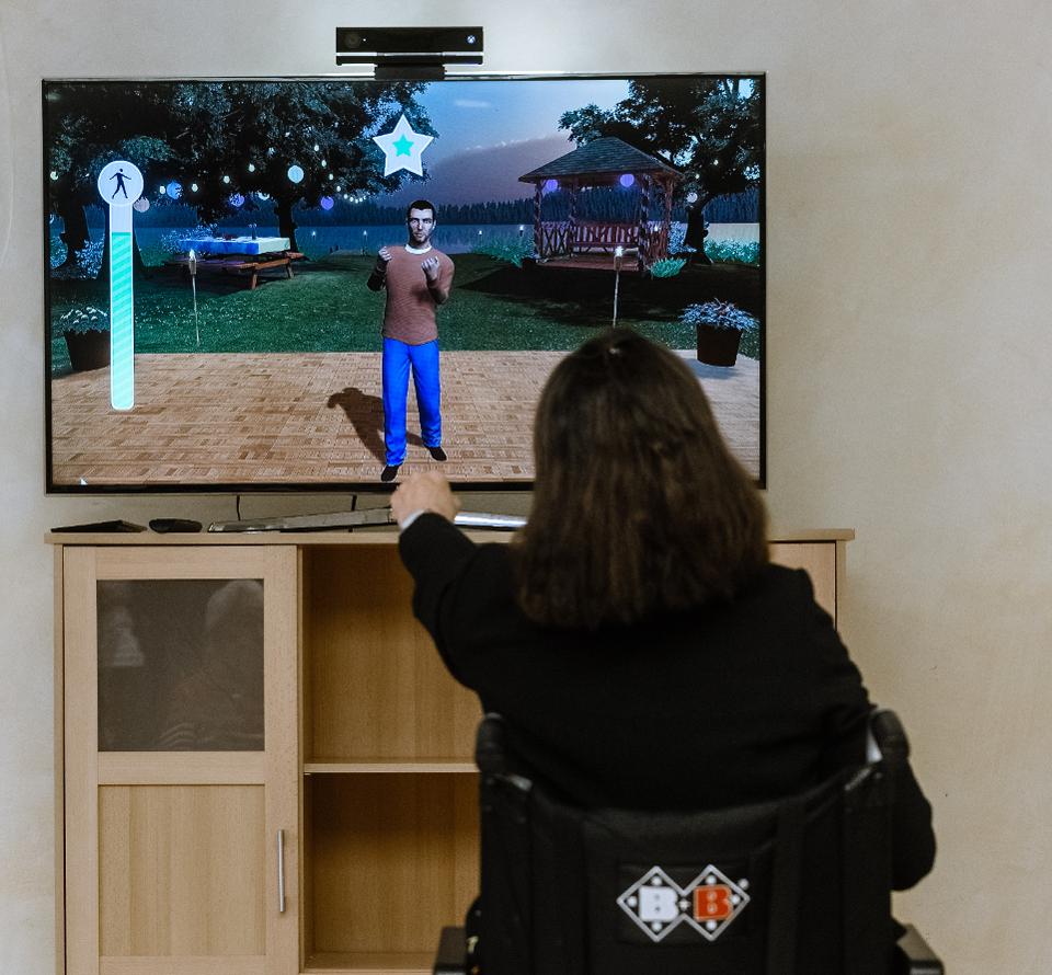 woman-using-video-game-to-help-with-pt