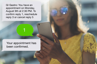 female on phone getting text message