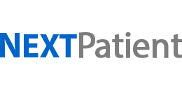 A patient at the front desk while staff is scheduling an appointment with practice management and EMA, an ophthalmology PM software suite