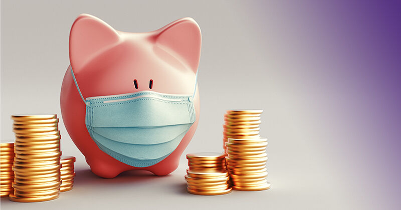 piggy bank wearing a medical mask