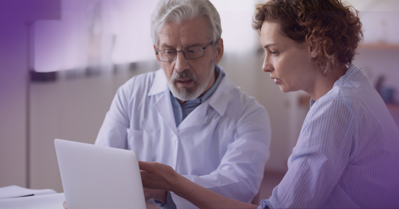 doctor looking at computer