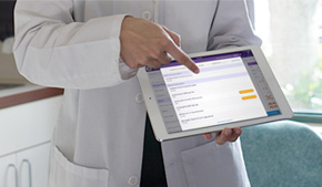 doctor pointing at ipad