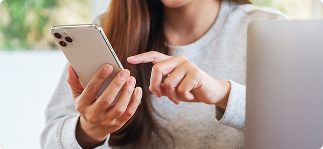 hand holding phone hand holding phone