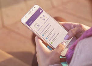 Image of woman using cell phone Image of woman using cell phone