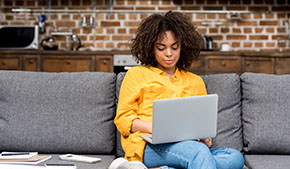 Person at home with laptop