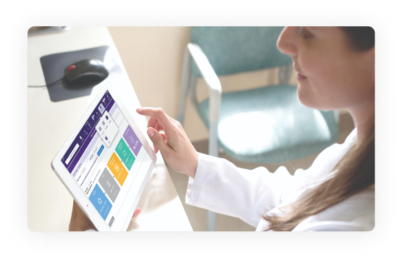 Staffer reviewing MIPS data on an iPad Staffer reviewing MIPS data on an iPad