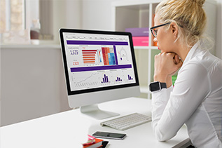 A practice administrator checks her analytics dashboard for insights