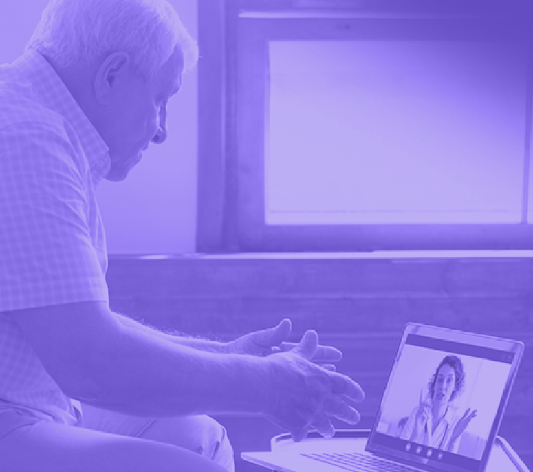 ModMed Telehealth Patient speaking to clinician on a laptop