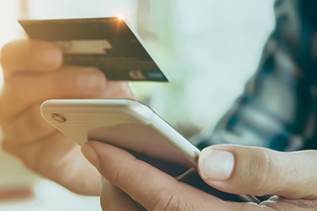A patient makes a payment with their credit card.