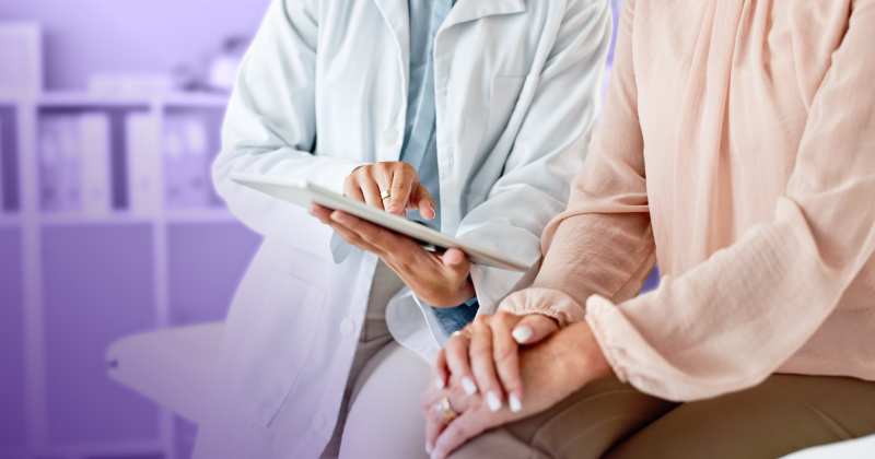 Physician showing the patient diagnostic imaging on an iPad