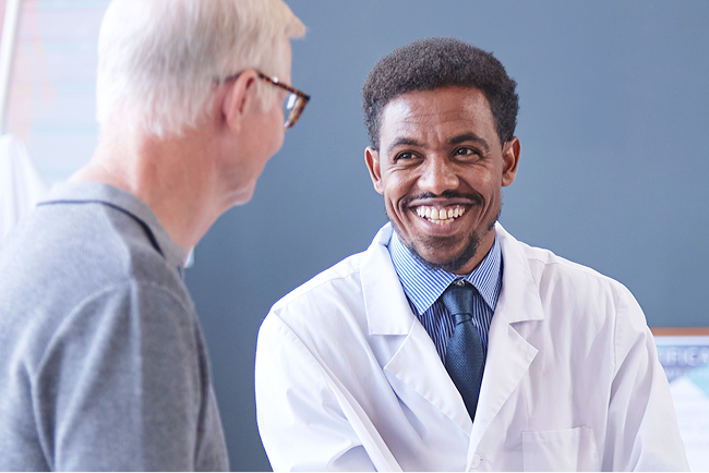 An ophthalmologist having a discussion with a patient.