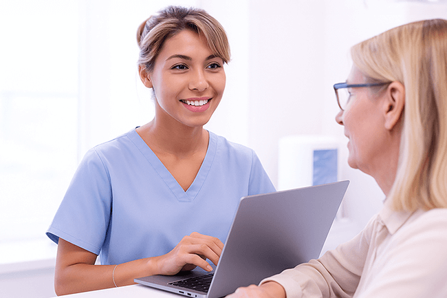 A patient scheduling her next appointment with a healthcare professional.