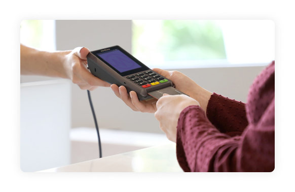 Patient pays at checkout using a credit card reader
