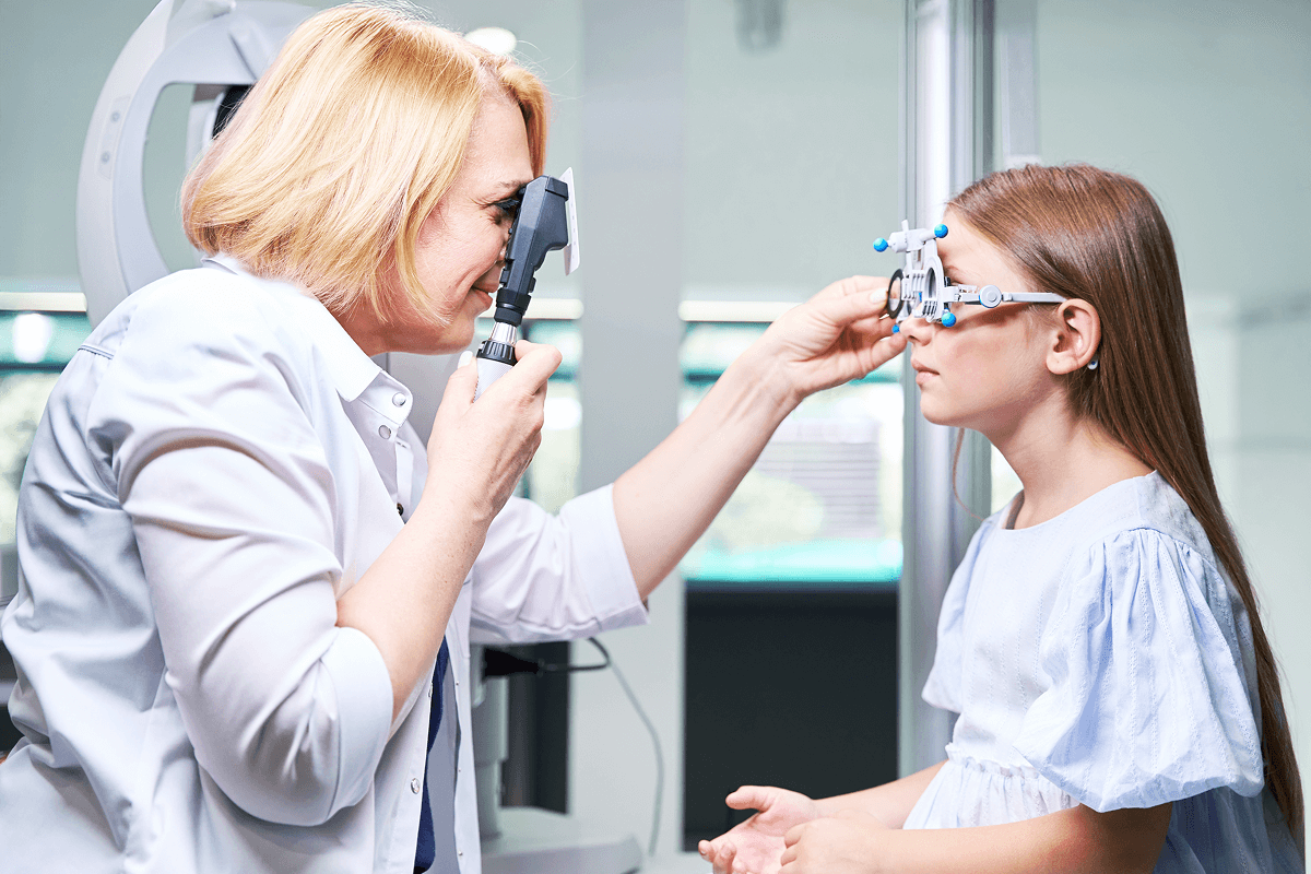 An image of a child getting an eye exam.