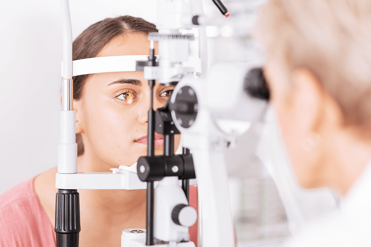 An image of a woman getting an eye exam.