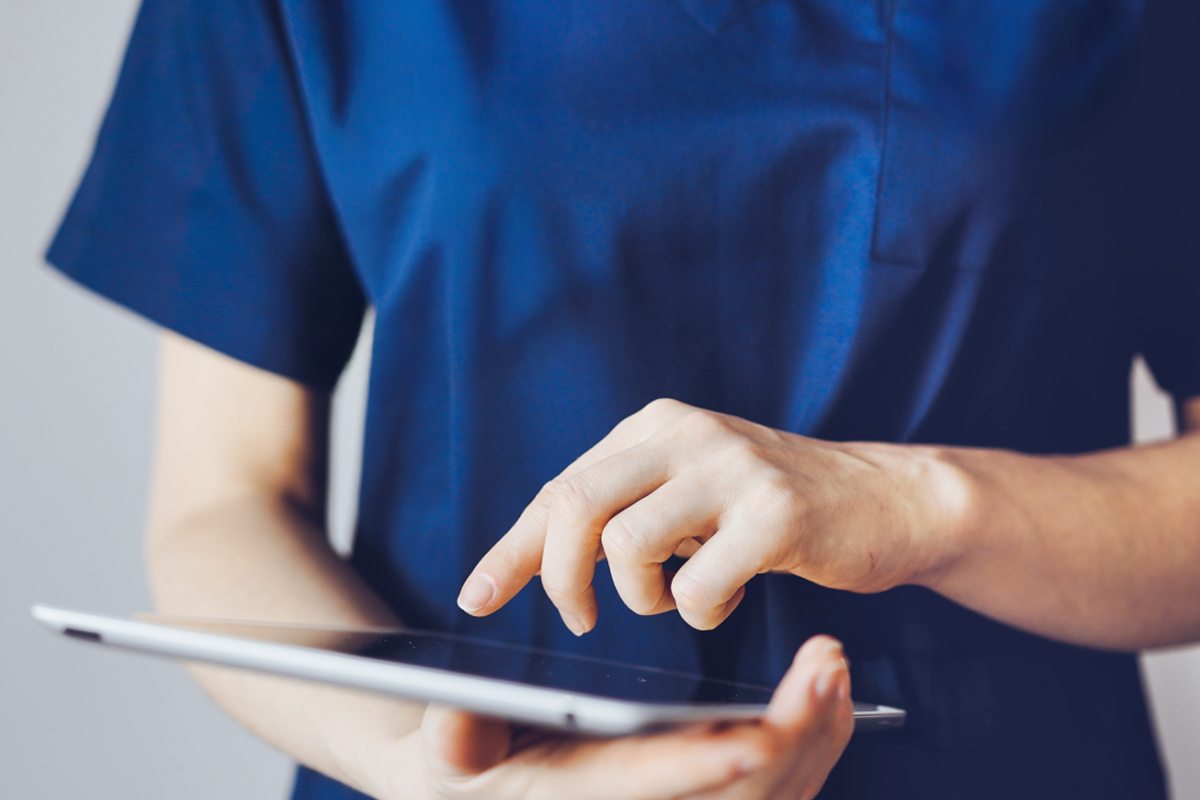 Healthcare provider using mobile iPad EHR system for more flexible documentation.
