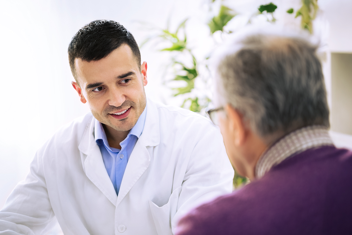 Physician speaking directly with patient during consultation to enhance engagement