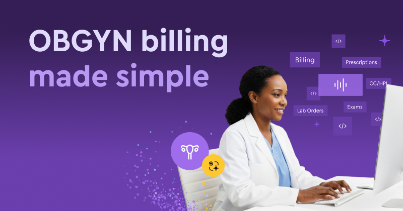 A smiling OBGYN doing medical billing and coding at a desktop computer