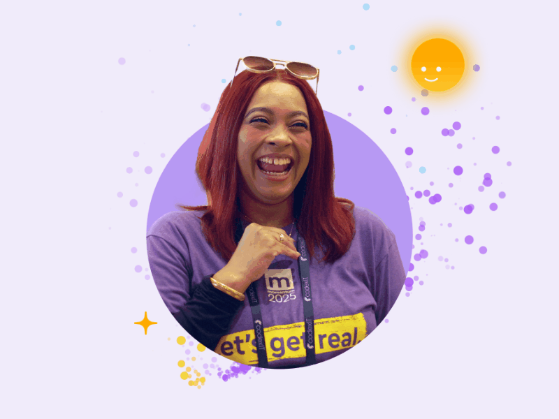 An animated graphic of a woman with red hair laughing joyfully, wearing a purple 'momentum 2025' shirt with the phrase 'let's get real.' The image features a purple circular frame, sparkling accents, and a smiling ModMed assistant icon.